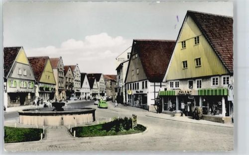 32839 W4939 Steinheim , Westf - Straßenansicht, Brunnen, Geschäft