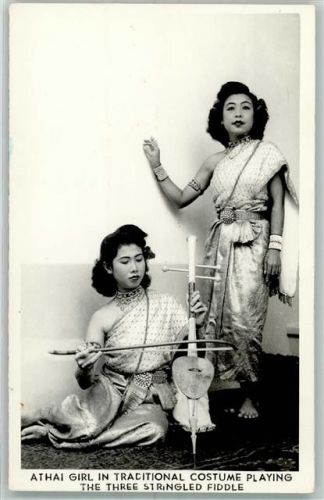 Athai Girl in tracitional Costume playing the three stringled Fiddle