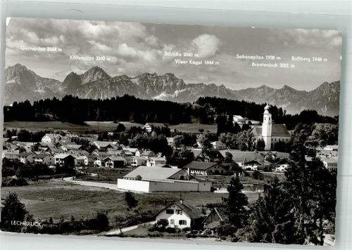 86983 W8923 Lechbruck Foto AK Panorama des Ortes mit Kirche Mariä Heimsuchung und Tiroler und Allgäuer Hochgebirge