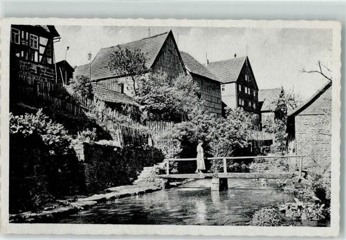 97772 W8789 Wildflecken Foto AK Malerischer Winkel Frau Brücke