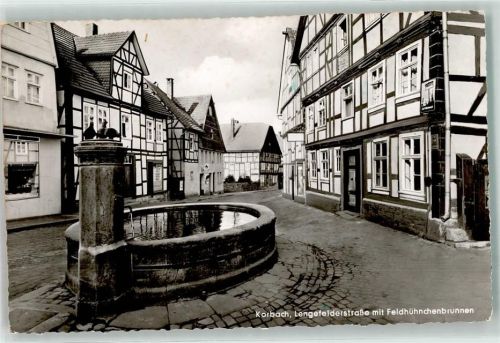 Korbach Lengenfelderstraße mit Feldhühnchenbrunnen Fachwerkhaus