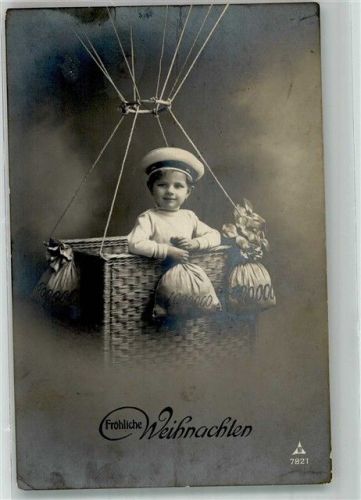 Weihnachten Kleiner Junge in der Gondel eines Fesselballons mit Geldsäcken PH 7821