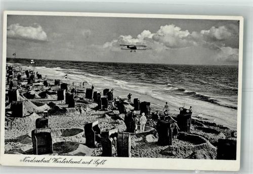 Westerland Doppeldecker über dem Strand WK II