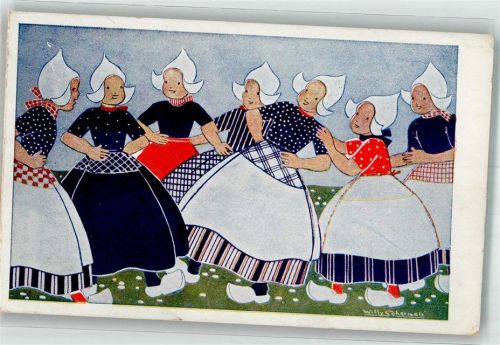 Hollandmädchen in Tracht beim Tanz auf der Wiese