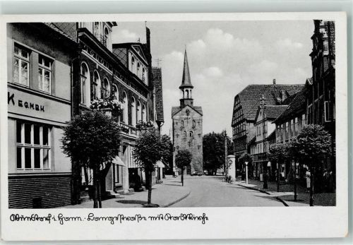 Wunstorf Langestraße mit Kirchturm Litfaßsäule