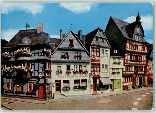Adenau Marktplatz und Blaue Ecke Gasthaus Frisör Fahnen Blumen