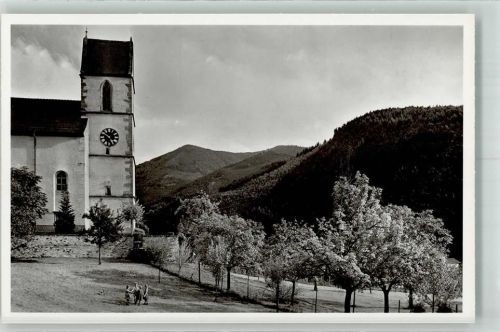 Altsimonswald Blühende Bäume vor der Kirche St. Sebastian