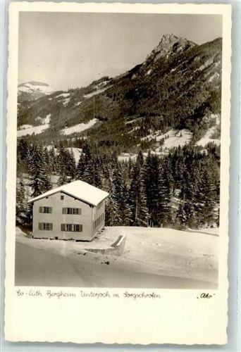 Unterjoch Winter Unterkunftshaus des Ev. Jungmännerwerks Württemberg mit Sorgschrofen