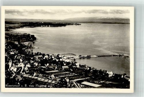 Immenstaad Fliegeraufnahme des Ortes mit Seebrücke und St. Jodokus Kirche