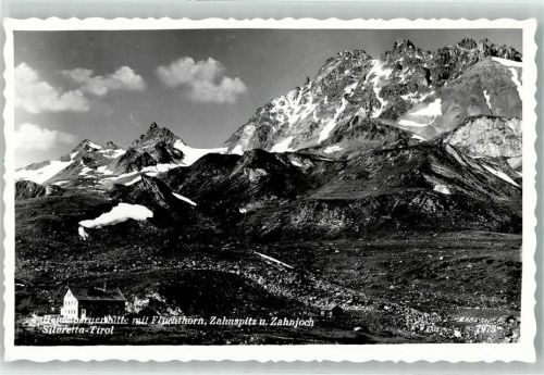 Ischgl Heidelberger Hütte mit Fluchthorn Zahnspitze u. Zahnjoch Hüttenstempel
