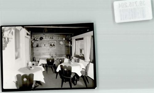 Morlesau Gasthaus Gastraum Tisch Stuhl Bluemen Kerzen Wandbild Vase Wandteller Pfeife Ort handschriftlich Original aus Archiv eines Ansichtskartenverlags