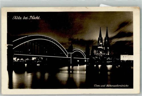 Köln Altstadt-Nord 103 1935 Hohenzollernbrücke mit Kölner Dom bei Nacht