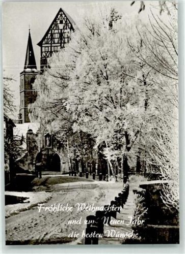Münnerstadt Fröhliche Weihnachten und zum neuen Jahr die besten Wünsche Kirche Fachwerk Winter Schnee Foto AK