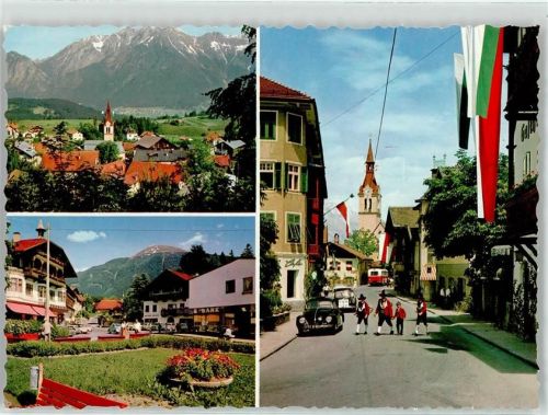 Igls Blick gegen Nordkette Ortsmitte mit Patscherkofel Auto VW Käfer Tracht