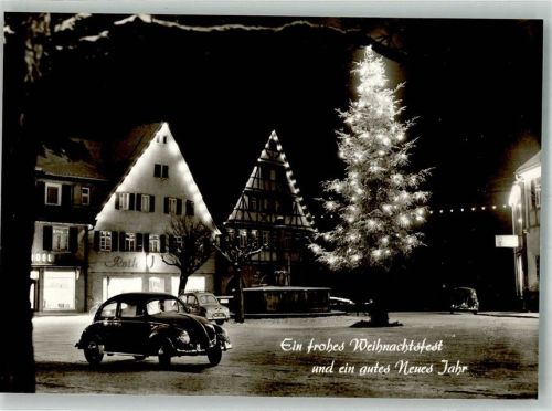Nürtingen VW Käfer vor leuchtendem Christbaum Weihnachten Neujahr