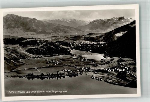 Bühl Fliegeraufnahme des Ortes mit Alpenpanorama