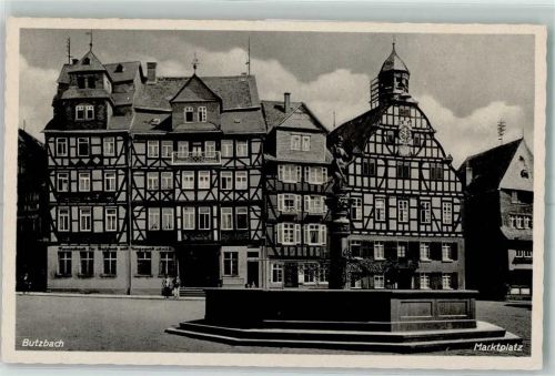 35510 W6308 Butzbach - Marktplatz Marktbrunnen Gasthaus Fachwerkhäuser