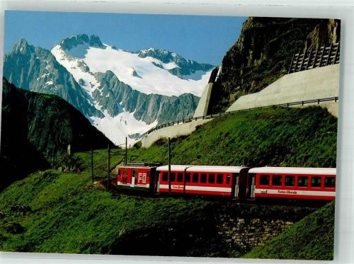 Andermatt Furka-Oberalp-Bahn mit dem Salbitschijen Fotograf Geiger