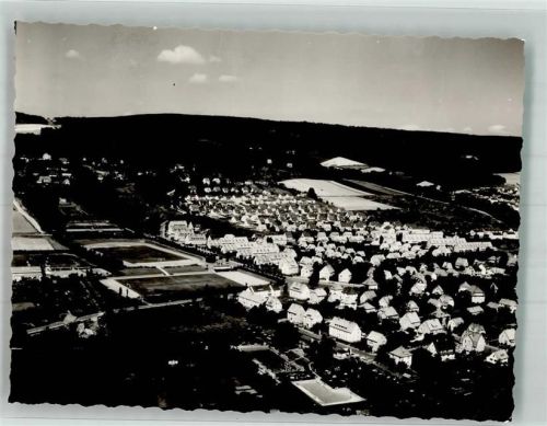 Einbeck Fliegeraufnahme des Ortes mit Neubaugebiet und Stadion Foto Original aus Archiv eines Ansichtskartenverlages Ort handschriftlich