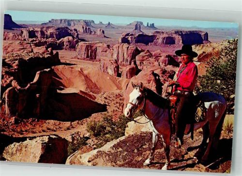 Indianer zu Pferde oberhalb des Monument Valley USA
