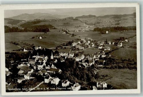 Simmerberg Fliegeraufnahme des Ortes mit Kirche St. Joseph