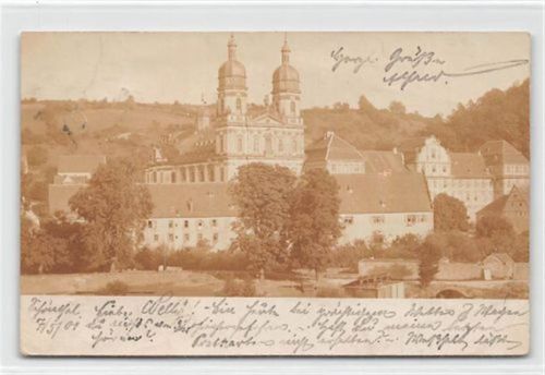 Fotokarte Künzelsau. Teilansicht mit Kirche gelaufen. Leichter Schrift- und Stempeldurchdruck, kleiner Knick oben und unten links, sonst gut erhalten
