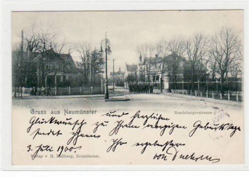Neumünster Neumünster mit Rendsburgerstrasse gelaufen, 1900. Ecken mit Albumabdrücken, leichte Stempelspuren, sonst gut erhalten