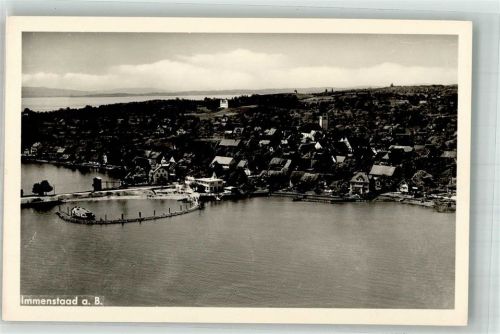 Immenstaad Fliegeraufnahme des Ortes mit Hafen und St. Jodokus Kirche