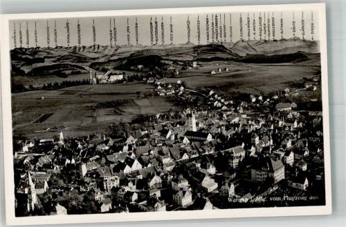 Wangen Fliegeraufnahme des Ortes mit Kirche St. Martin und Alpenpanorama
