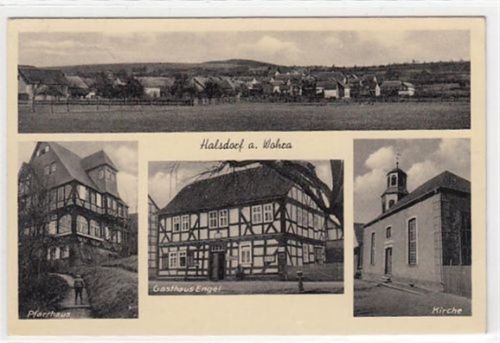 Halsdorf a. Wohra mit Pfarrhaus, Gasthaus Engel und Kirche gelaufen, 1940, rückseitiger Stempel: Heimbach über Treysa. Leichter Stempeldurchdruck, leichter Bug oben rechts, sonst gut erhalten