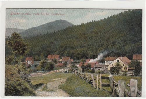 Sieber im Harz. Partie bei der Oberförsterei gelaufen, 1910. Ecken mit Albumabdrücken, leichter Bug unten rechts, leichte Abschürfungen, sonst gut erhalten