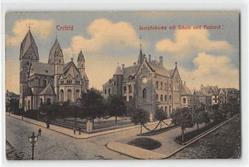 Krefeld Krefeld. Josephskirche mit Schule und Pastorat gelaufen. Leichter Stempeldurchdruck, kleiner Knick unten rechts, sonst gut erhalten