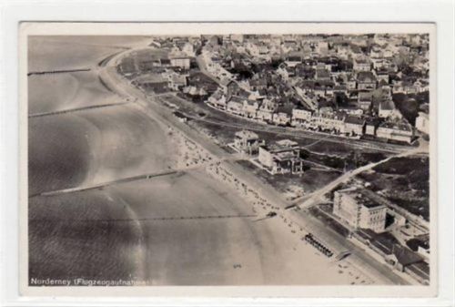 Norderney Norderney mit Flugzeugaufnahme gelaufen, 1936. Leichter Schrift- und Stempeldurchdruck, sonst gut erhalten