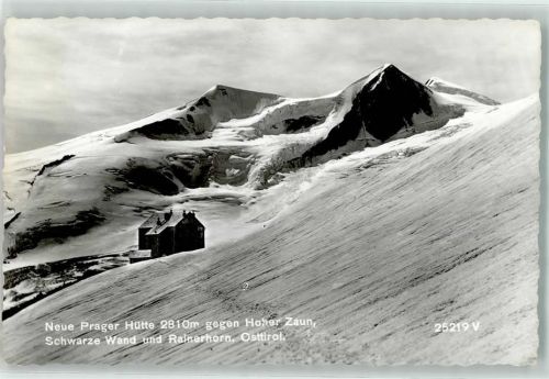 Matrei Winter neue Prager Hütte gegen Hoher Zaun Schwarze Wand und Rainerhorn Hüttenstempel