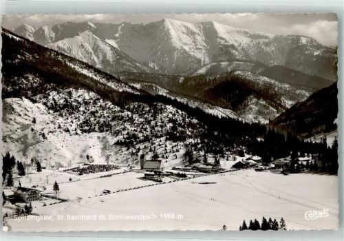 Spitzingsee Fliegeraufnahme St. Bernhard mit Sonnenwendjoch im Schnee
