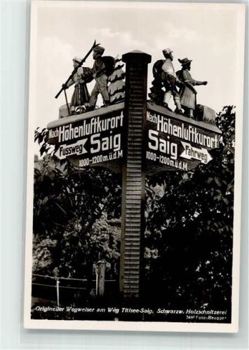 Saig Handgeschnitzter Wegweiser nach Saig Fuß- und Fahrweg Fotograf Karl Brugger