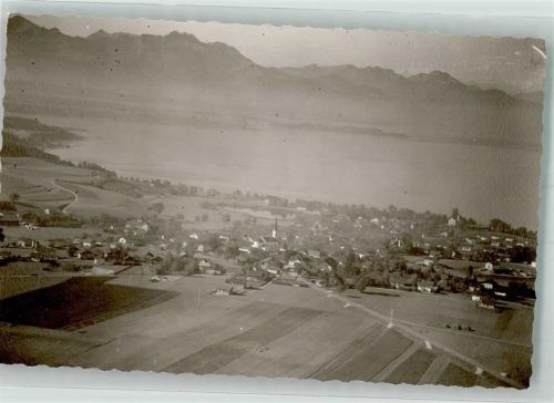 Chieming Fliegeraufnahme des Ortes mit Kirche Maria Himmelfahrt Foto Original aus Archiv eines Ansichtskartenverlags Ort handschriftlich