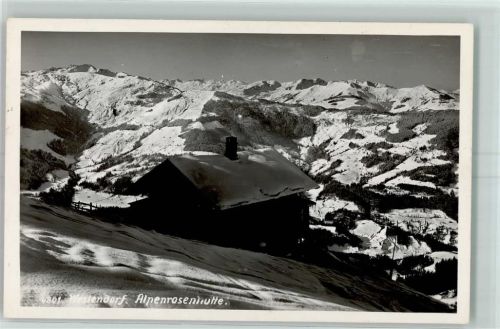Westendorf Alpenrosenhütte im Winter + Hüttenstempel Berghütte Foto AK