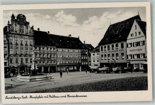 Landsberg Hauptplatz mit Rathaus und Marienbrunnen Gasthaus zum goldenen Stern LKW