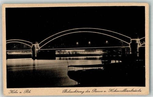 Köln Altstadt-Nord 103 Die beleuchtete Hohenzollernbrücke bei Nacht anläßlich der Internationalen Presse-Ausstellung