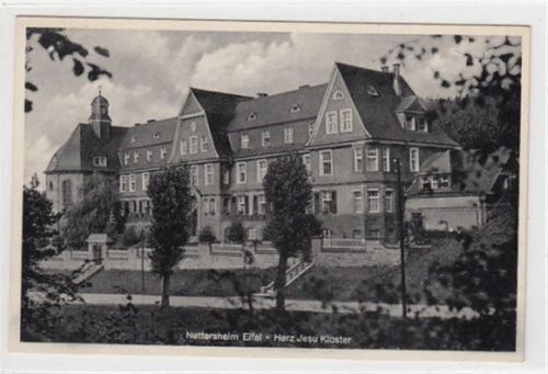 Nettersheim Nettersheim in der Eifel. Partie am Herz-Jesu-Kloster gelaufen, mit Marke und Stempel, Datum nicht lesbar, ca. 1940. Gute Erhaltung.