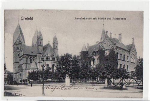 Krefeld Krefeld mit Josephskirche, Schule und Pastorhaus gelaufen, mit Marke und Stempel von 1912 kleiner Knick unten links, leichte Stempelspuren, sonst gut erhalten