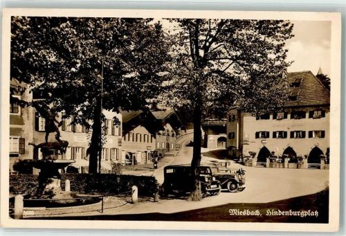 Miesbach Hindenburgplatz Brunnen Autos Gasthaus