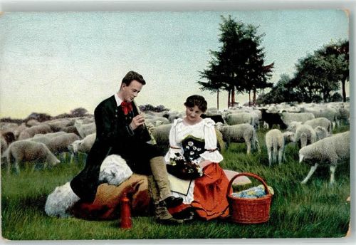 1906 Schäfer spielt einer Frau in Tracht beim Piknick auf der Flöte vor
