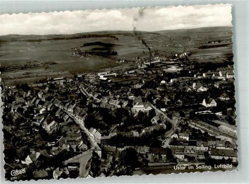 37170 W3418 Uslar Foto AK Fliegeraufnahme des Ortes mit Kirche St. Konrad