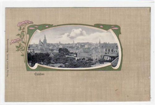 Lutherstadt Eisleben Passepartoutkarte von Eisleben mit Gesamtansicht. Postalisch nicht befördert, frühe Karte, da Anschriftsseite noch ungeteilt. Leichte Abschürfungen und Anhalftungen Rückseite vom Album, sonst gut erhalten.