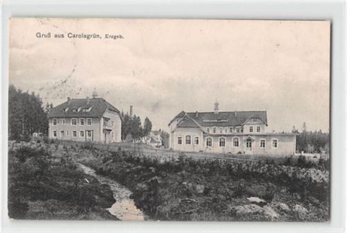 Carolagrün im Erzgebirge. Partie am Bach mit Häuser gelaufen. Leichte Stempelspuren, leichter Stempeldurchdruck, sonst gut erhalten