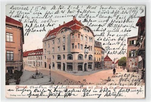 Lörrach, Lithographie. Baslerstraße mit Blick in die Herrenstraße gelaufen. Leicht fleckig, kleiner Knick unten links, leichte Abschürfungen, sonst gut erhalten
