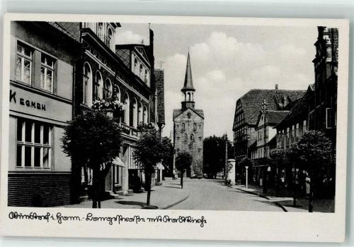 Wunstorf Langestraße mit Kirchturm Litfaßsäule