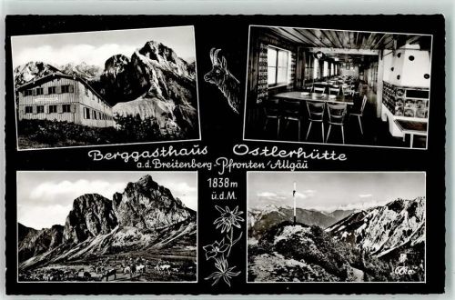 Ostlerhütte Berggasthaus Gastraum Kachelofen Gipfelkreuz Gemse Hüttenstempel